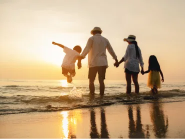 Family enjoying beach holiday together in Lakshadweep