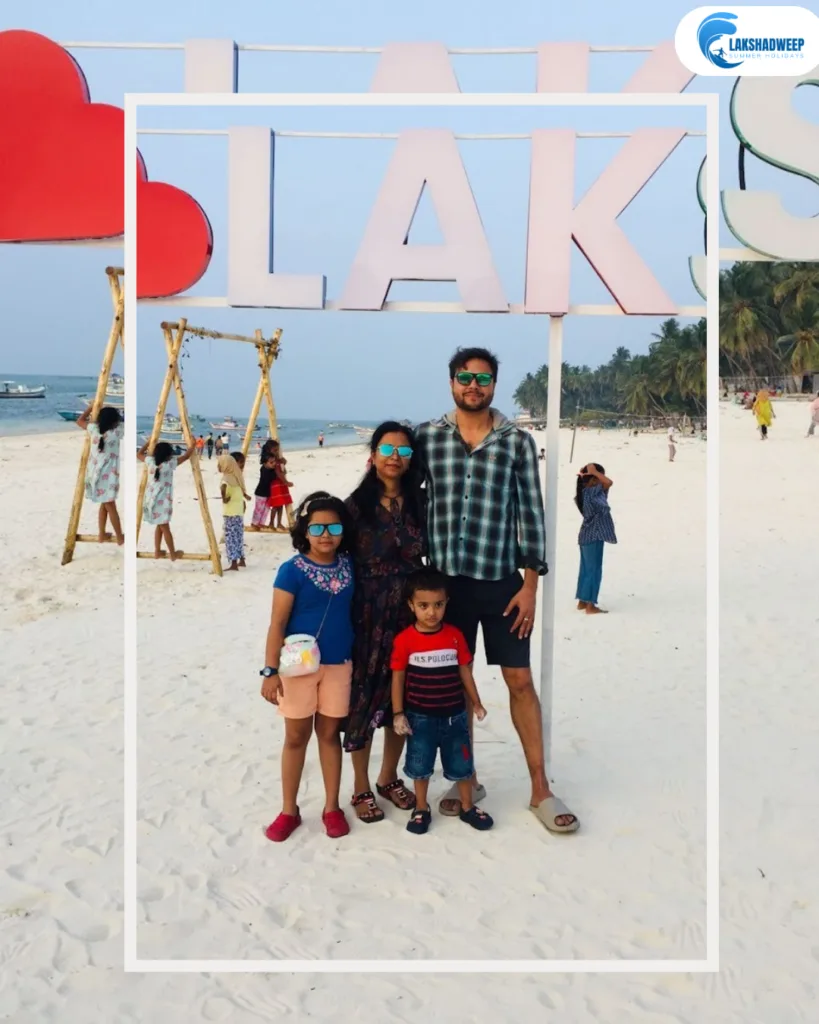 Family posing at Lakshadweep island beach